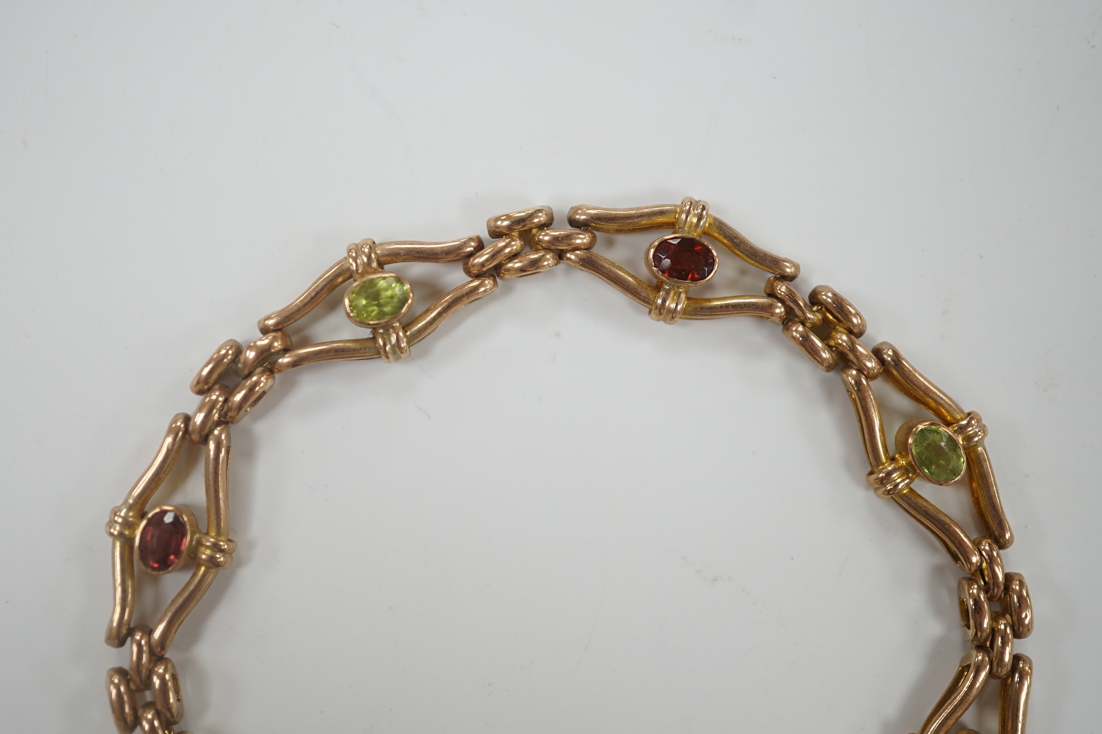 An Edwardian 9ct and gem set open link bracelet, 18cm, gross weight 9.3 grams.